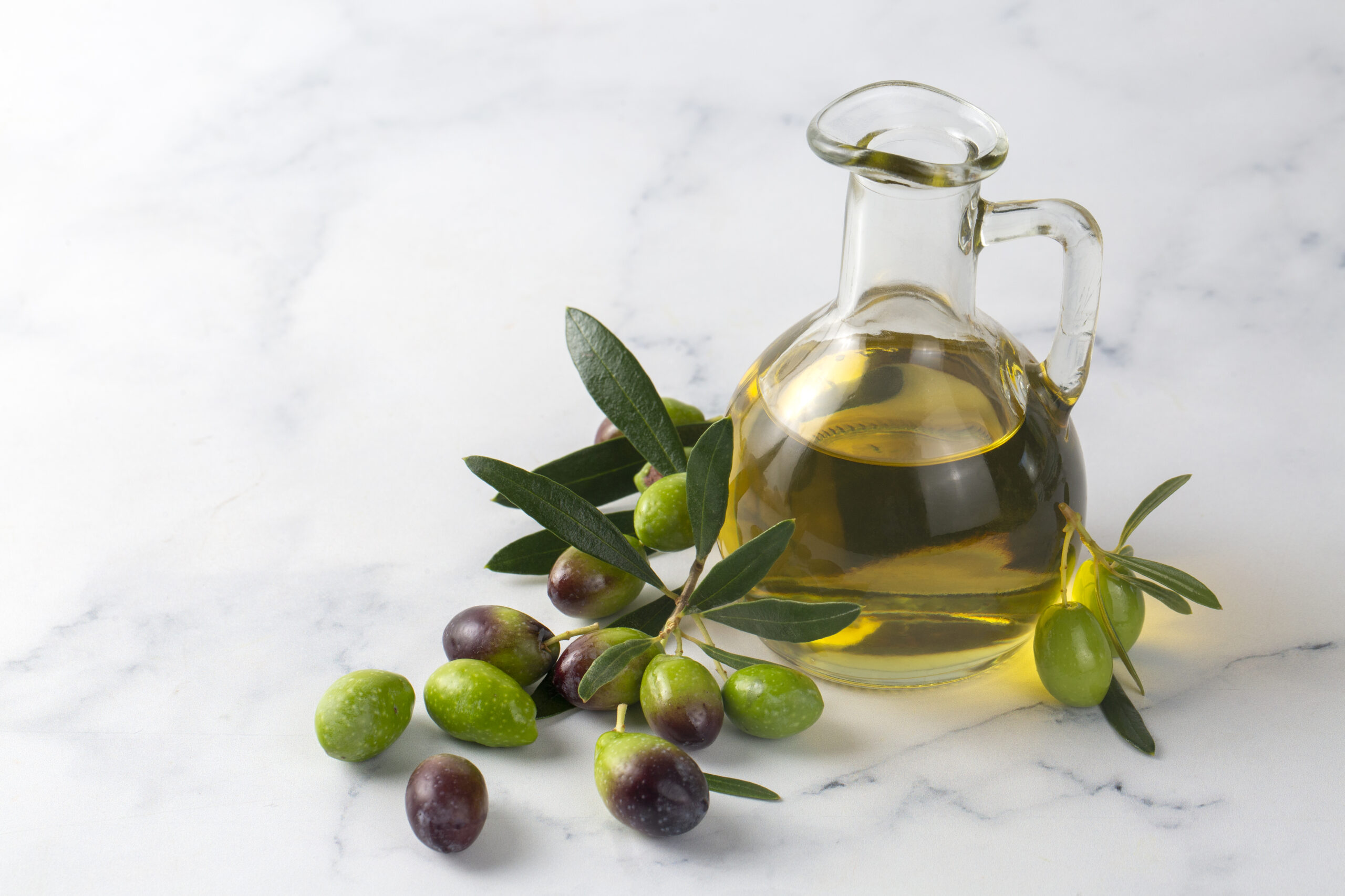 Green fresh olive and olive oil